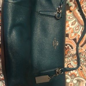 Dark green Coach tote and wristlet